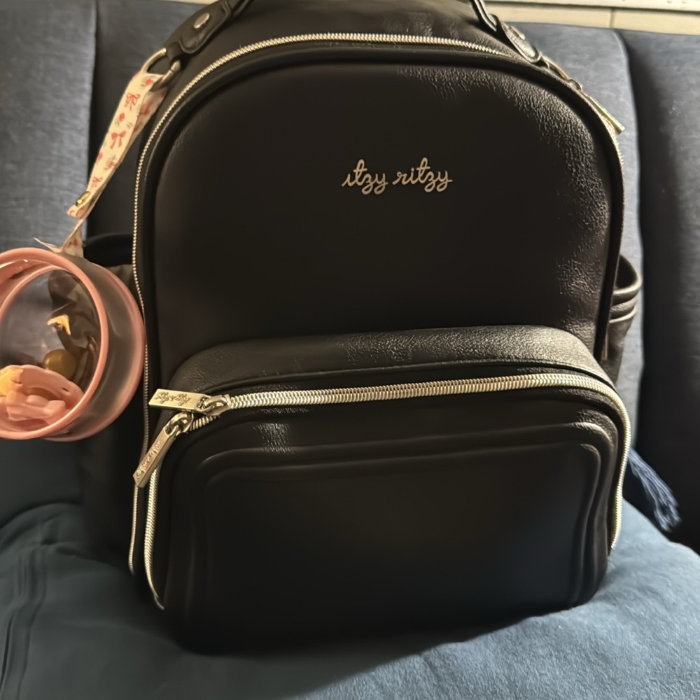 Itzy Ritzy Mini